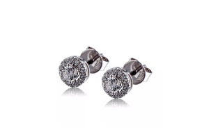 Pendientes en oro blanco y orla de brillantes “115AR185”